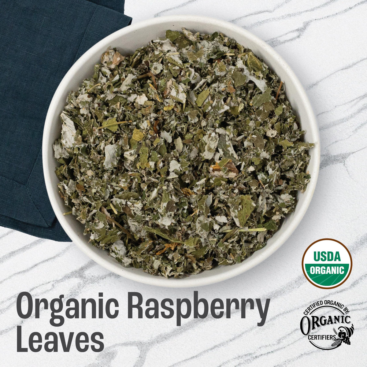 J Mac Botanicals raspberry leaf dried leaves on natural surface