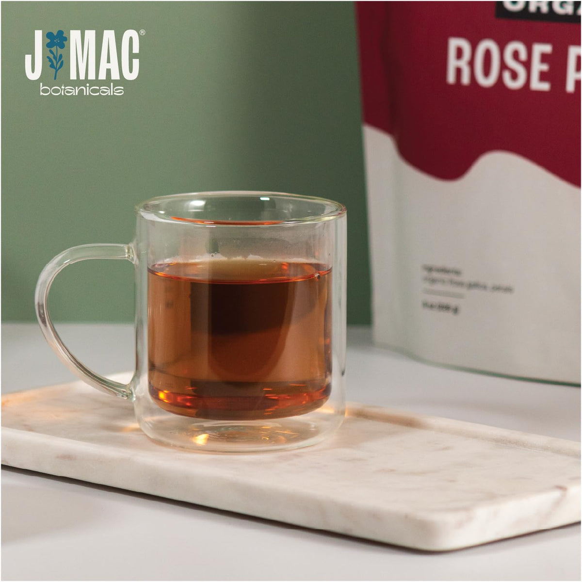 Rose petals steeping in a cup for fragrant herbal tea