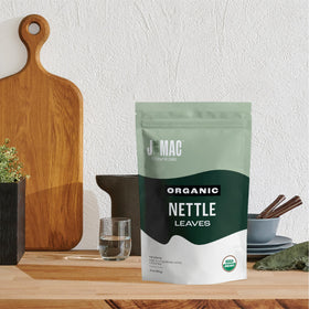 J Mac Botanicals steam rising from a cup hints at a soothing ritual.