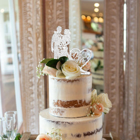 Jaciya sparkling cake topper with rhinestones for celebrations.