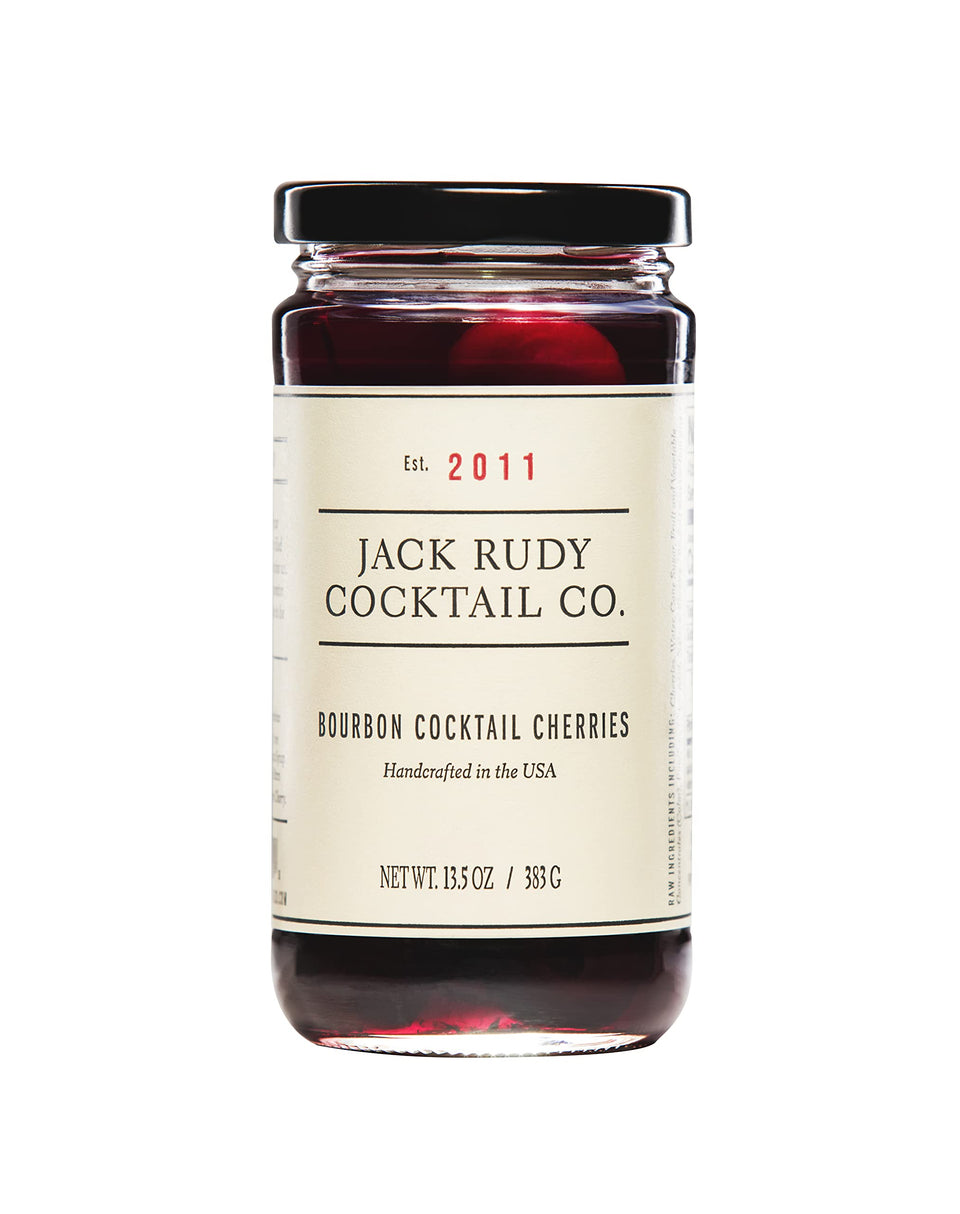 Jack Rudy Cherries Bourbon Barrel Aged bottle pouring into a cocktail for depth of flavor