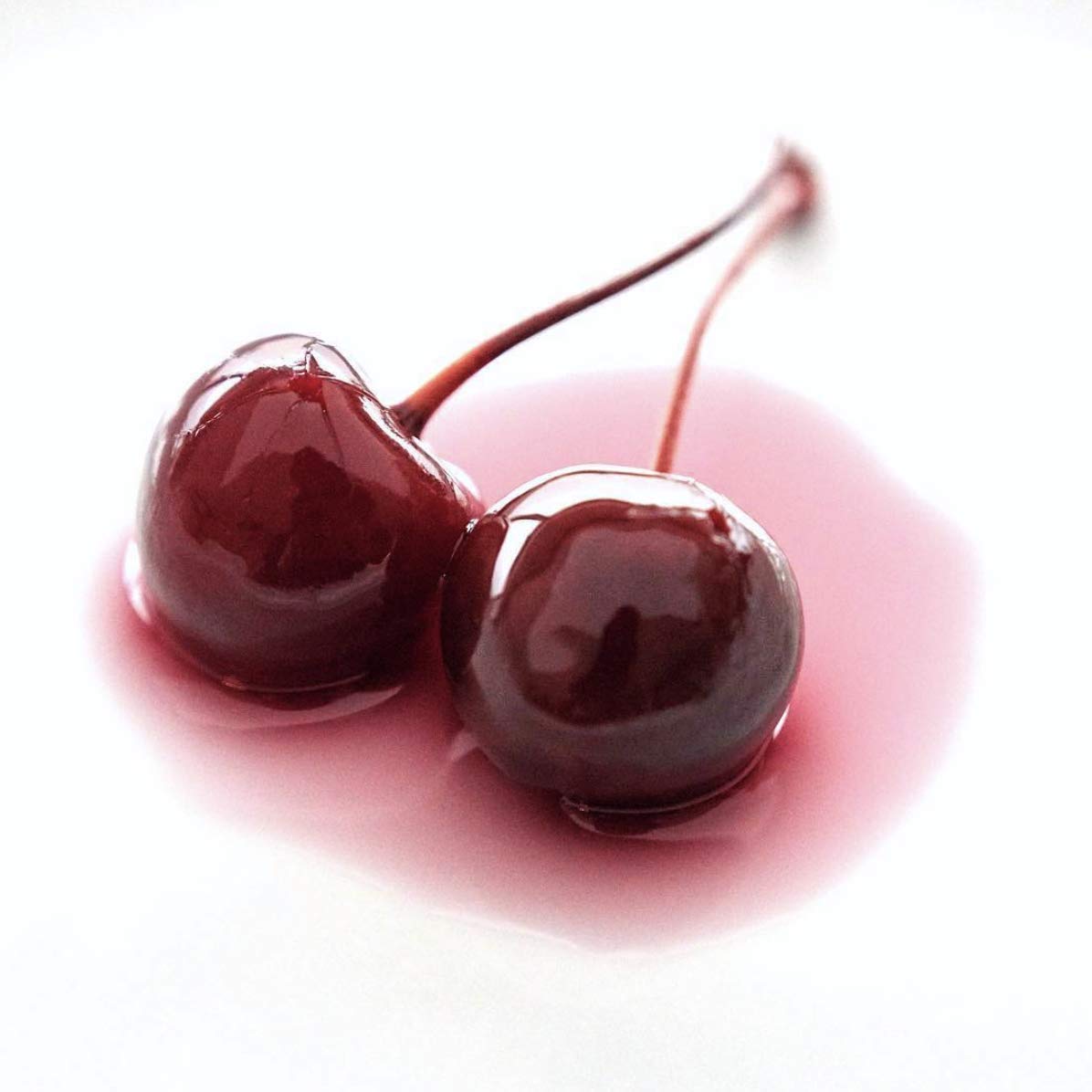 Cherries being served with an Old Fashioned for a sophisticated garnish