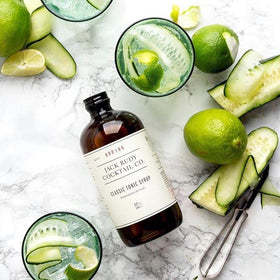 Jack Rudy tonic syrup glass with cocktail demonstrates versatility and ease.