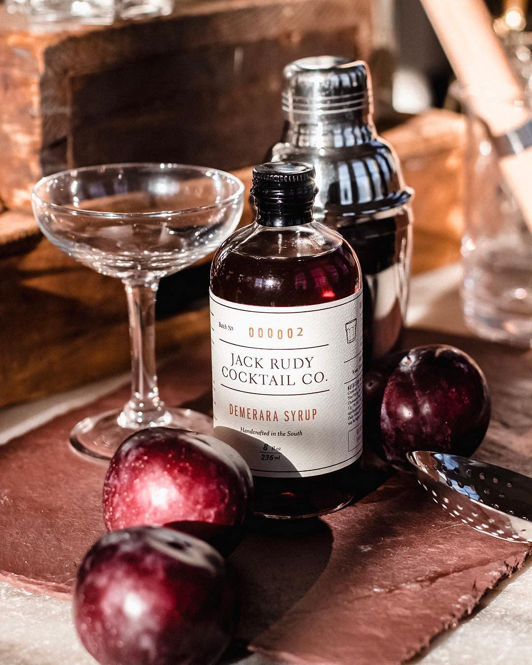 Jack Rudy Demerara syrup poured over ice showcases amber richness