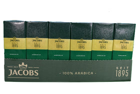 Jacobs Kronung cup of coffee steaming ideal for morning rituals.