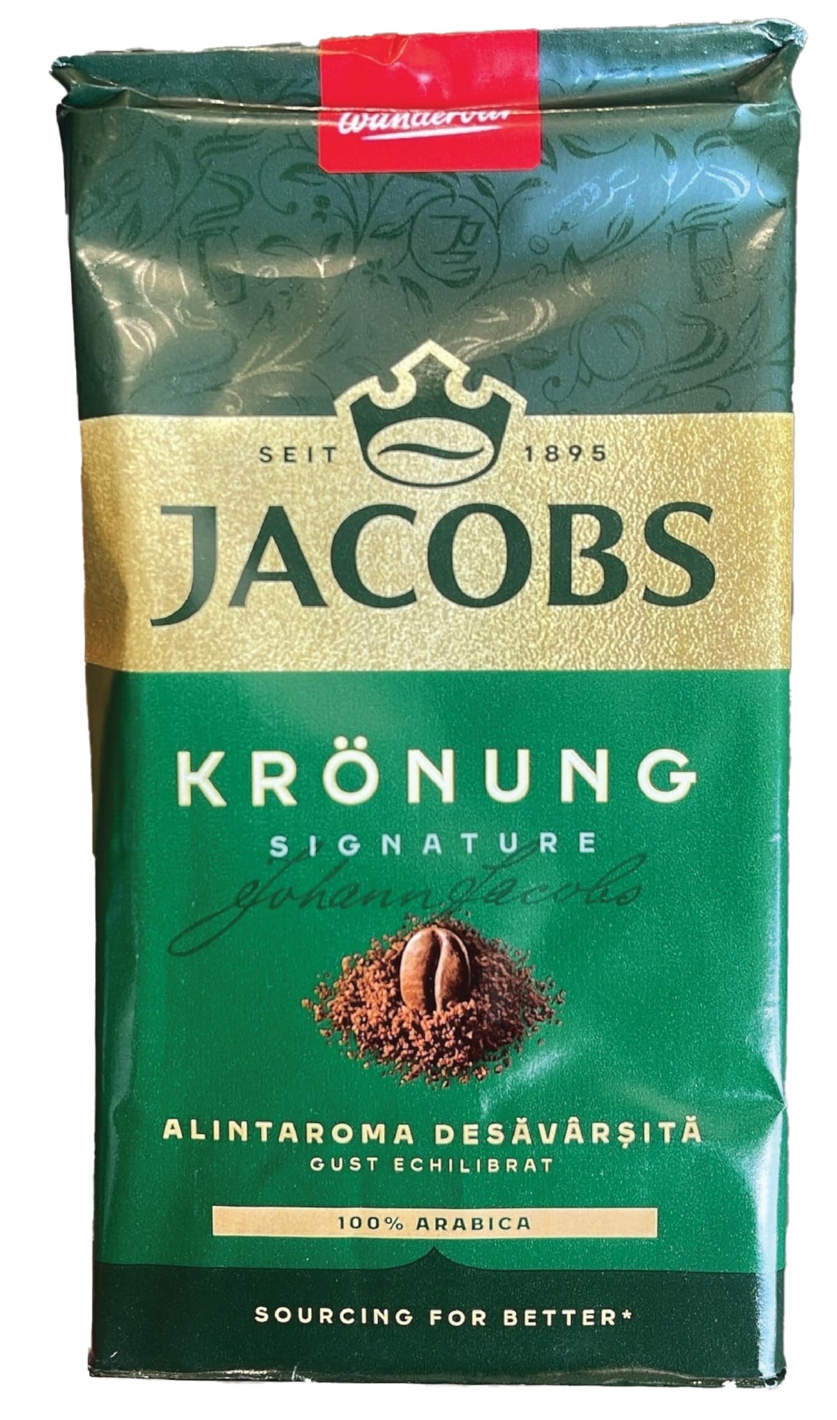 Close-up of Jacobs Kronung label highlighting quality and aroma potential.