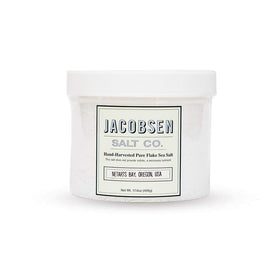 Jacobsen Salt Co. Pure Flake Finishing Salt bottle pour enhances finish on dishes.