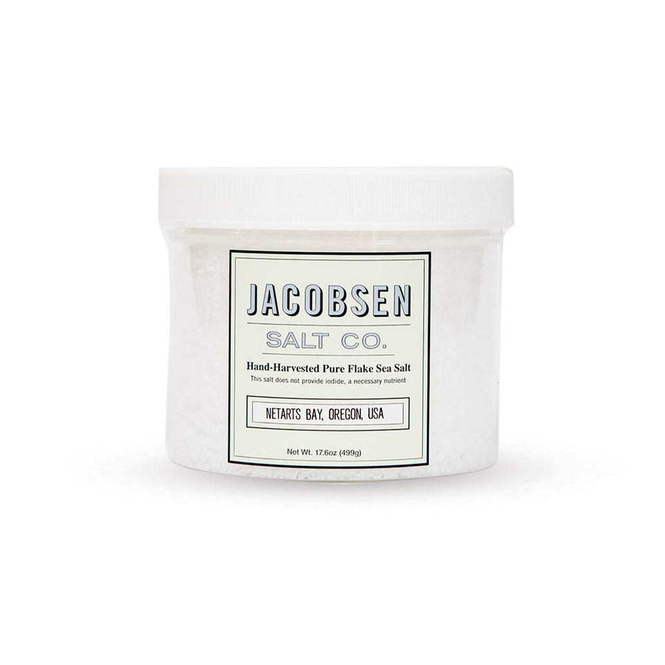 Jacobsen Salt Co. Pure Flake Finishing Salt bottle pour enhances finish on dishes.