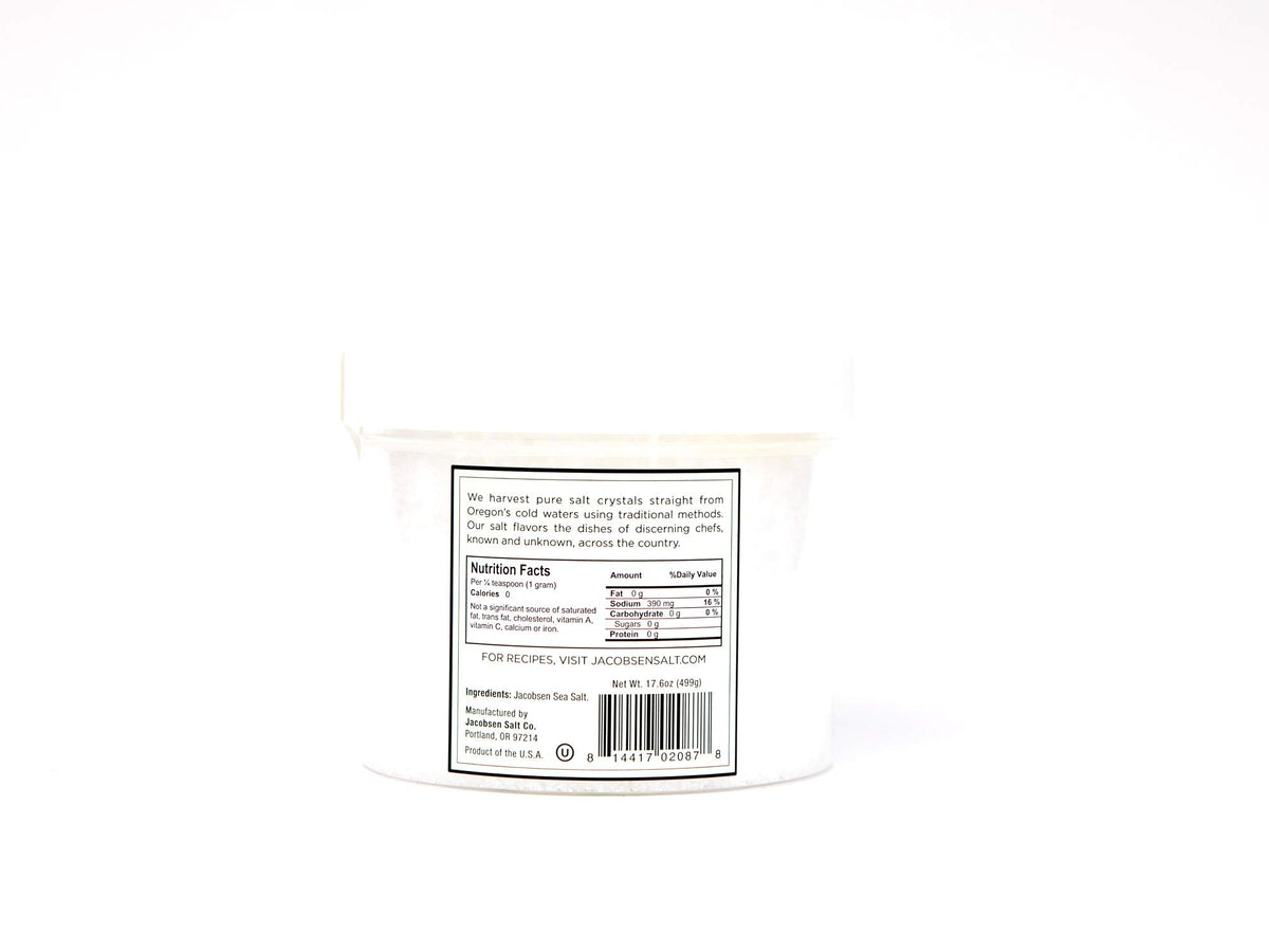 Jacobsen Salt Co. Pure Flake Finishing Salt crystal closeup highlights delicate crunch for finishing dishes.