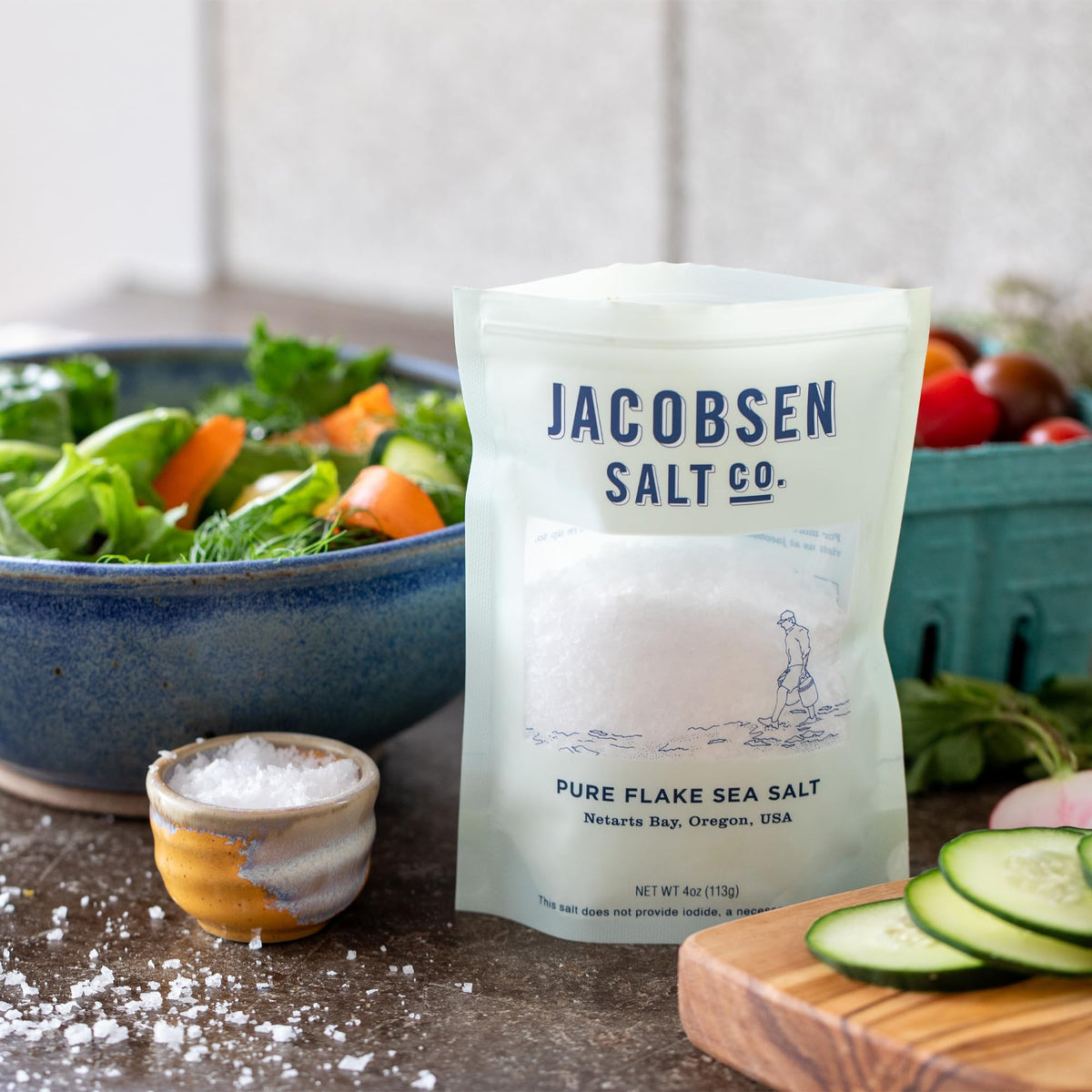 Jacobsen Salt Co. kitchen scene highlighting flaky texture at the table