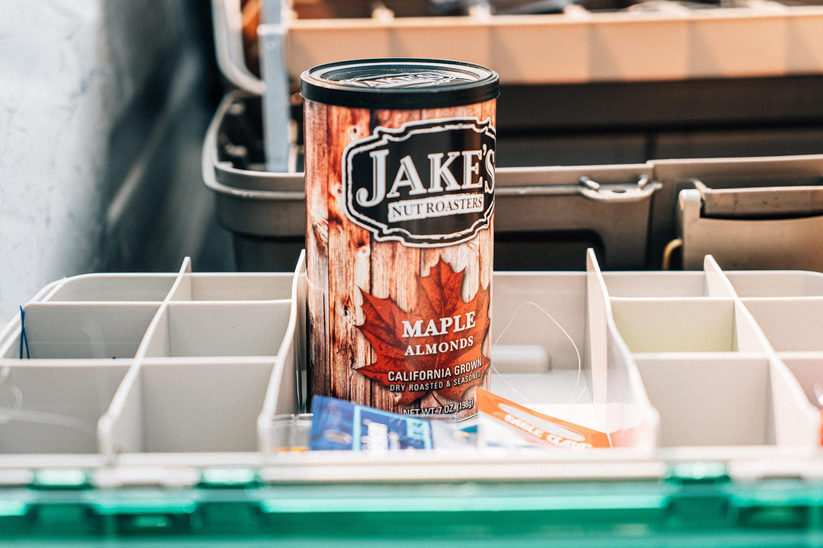 Jake's Nut Roasters Sweet Maple Almonds 2-pack close-up shows caramel-toffee sweetness enhancing snack appeal.