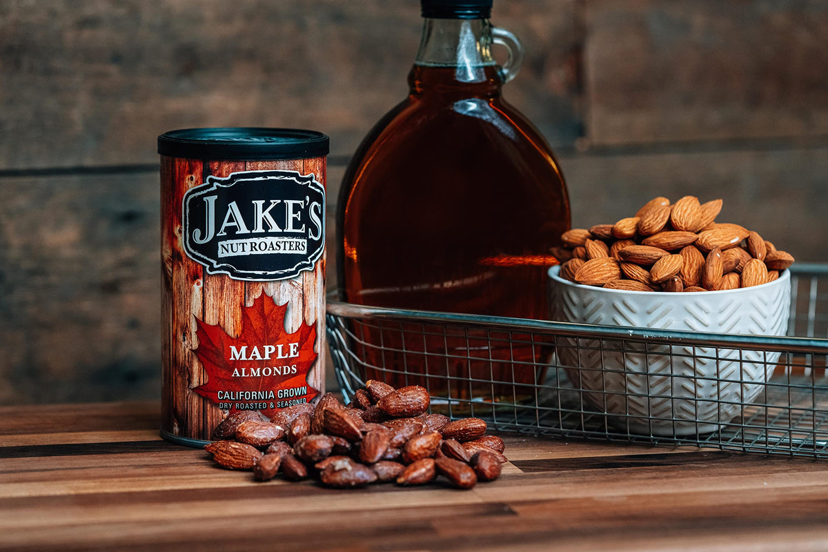 Jake's Nut Roasters Sweet Maple Almonds 2-pack open bowl highlighting glossy roasted almonds for quick protein.
