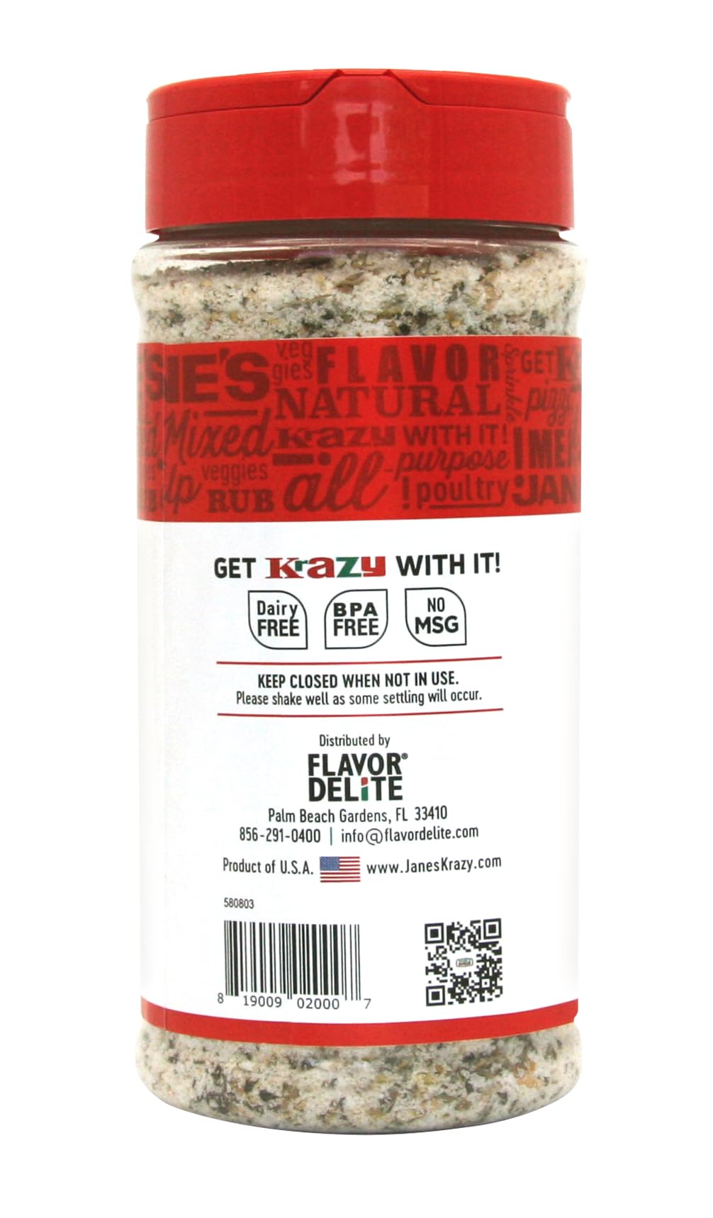 Jane's Krazy Mixed-up Original Salt Blend shaker dispensing evenly on food.