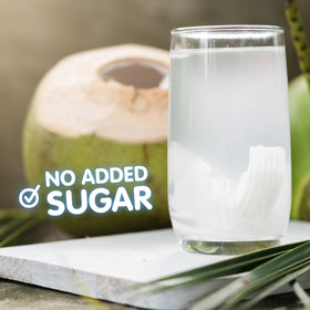 Jans coconut water with pulp over ice, ideal for light, natural hydration.