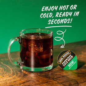 Java House hot coffee pour from a decaf capsule into a mug.