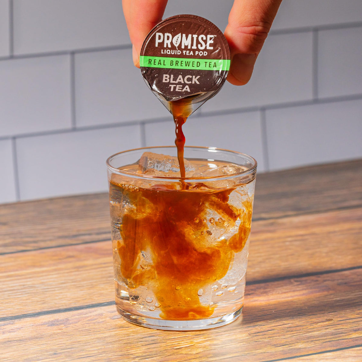 Java House Promise Tea glass serve exposing clean, refreshing flavor ready to drink