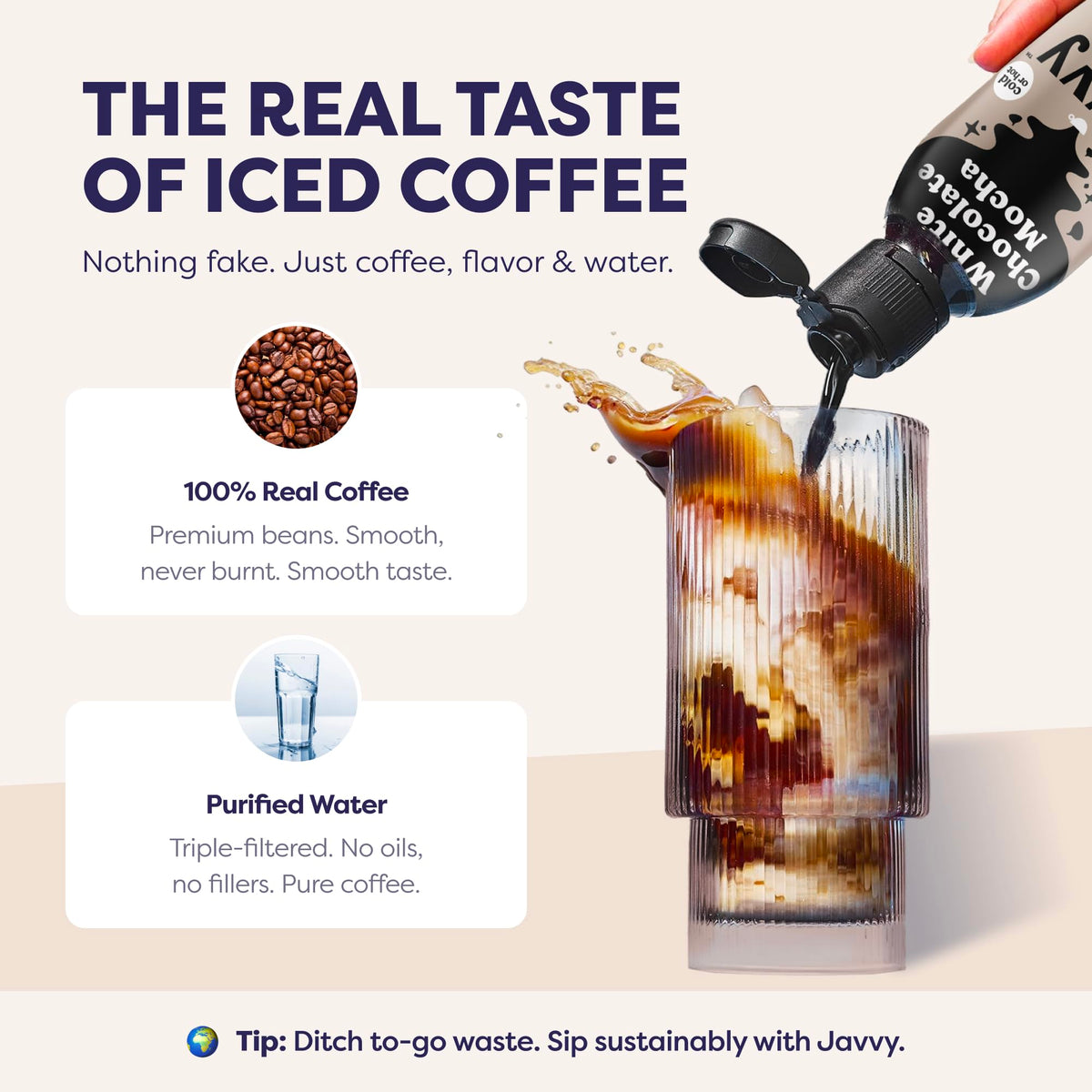 Javvy concentrate beside a glass of iced coffee highlighting cold brew versatility.