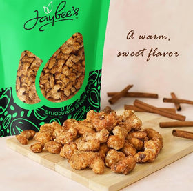 Jaybee's Cinnamon Toffee Cashews bag open, resealable lid preserves freshness.