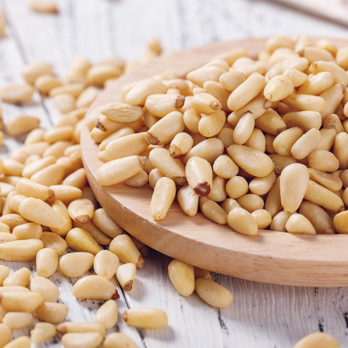 Jaybee's Pine Nuts Raw inside a sealed bag preserving natural oils and flavor