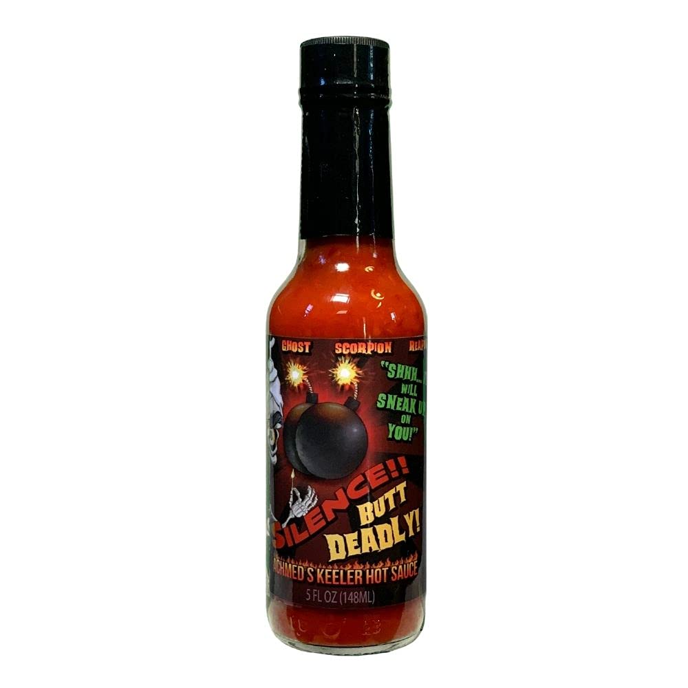 Jeff Dunham Achmed's Keeler Hot Sauce bottle pour for fiery eggs and wings.