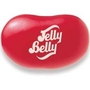 Close-up of glossy red Jelly Belly Cinnamon beans highlighting authentic cinnamon flavor.