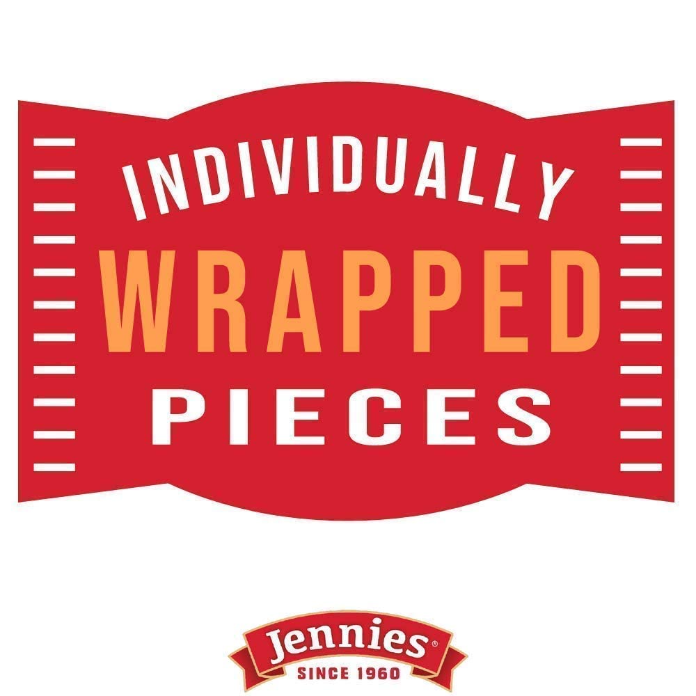 Jennies dark chocolate bites texture shot reveals glossy chocolate with coconut crunch.