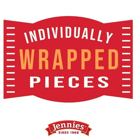 Jennies dark chocolate bites texture shot reveals glossy chocolate with coconut crunch.