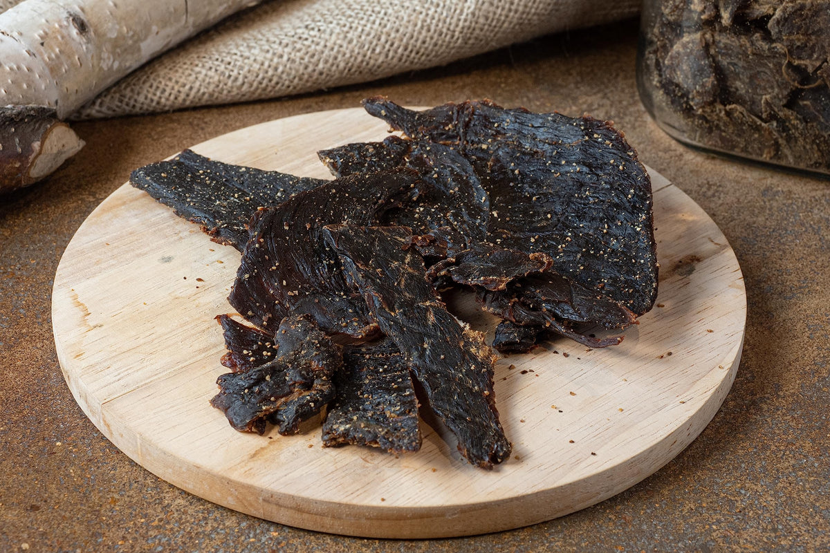 Jerky.com Original Venison Jerky 3-Pack packaging closeup showing all natural ingredients