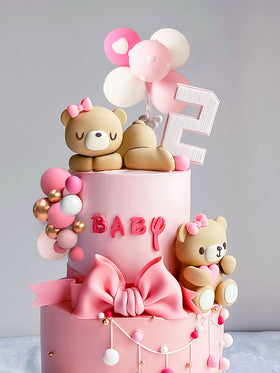 JeVenis bear cake decors provide cute focal ornaments for tiered cakes.