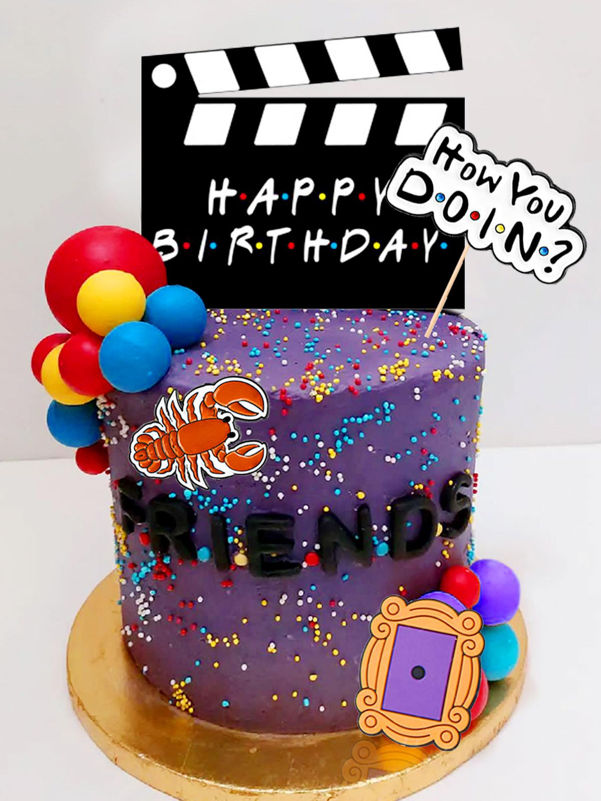 JeVenis friend cake topper set on cake for a memorable birthday moment.