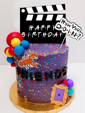 JeVenis friend cake topper set on cake for a memorable birthday moment.