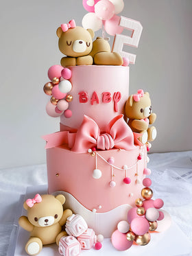 JeVenis pink balls cake decor adds soft color accents to birthday or baby showers.