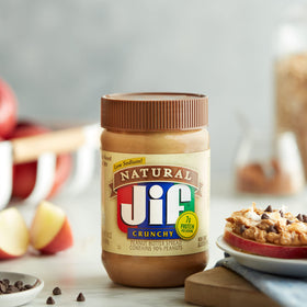 Jif jar with spoon illustrating no-stir convenience and crunchy texture.