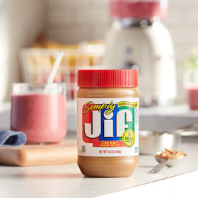 Spoonful of Jif Simply Creamy in a mixing bowl