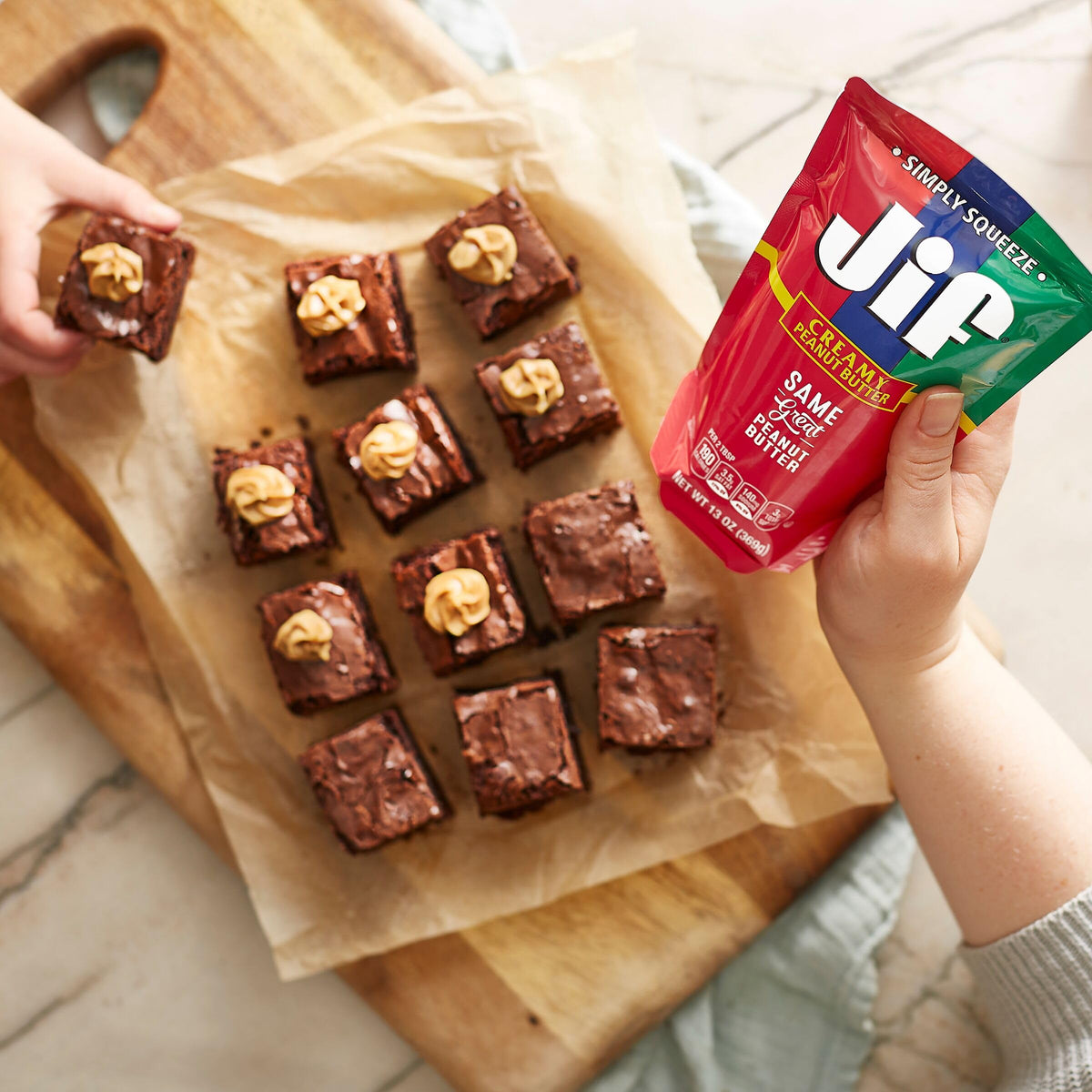 Jif Squeeze Creamy Peanut Butter pouch kids snack friendly and mess-free.