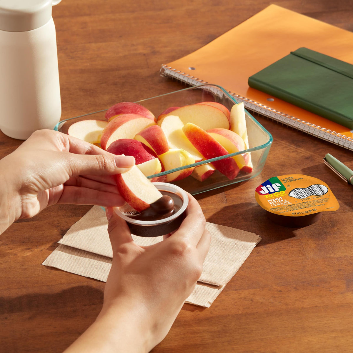Jif To Go spread on rice cakes for a quick bite on the move.