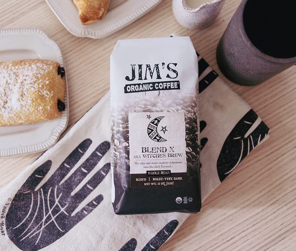 Jim's Organic Coffee Blend X steaming cup invites deep aroma