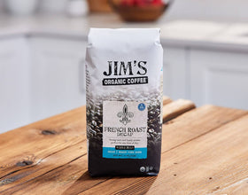 Jim's Organic Coffee dark roast beans in one-way valve bag deliver freshness