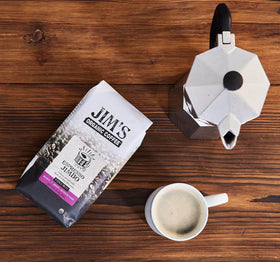 Brewing setup with Jim's Organic Coffee ready for tasting
