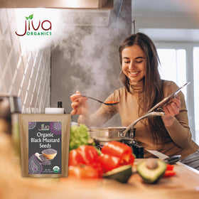 Jiva Organics seeds on measuring spoon for precise seasoning