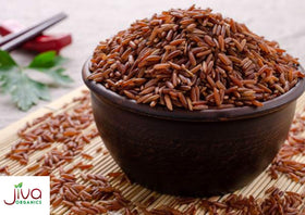 Close-up of Jiva Organics red rice grains, premium organic quality.