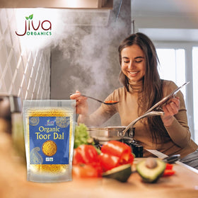 Jiva Organics Toor Dal Kori measuring-cup scene emphasizes portion control and meal prep.