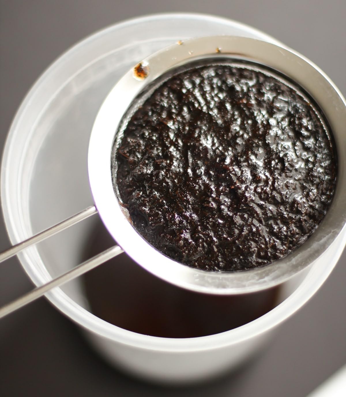 JL Gourmet Imports Vanilla Bean Paste jar open reveals vanilla specks