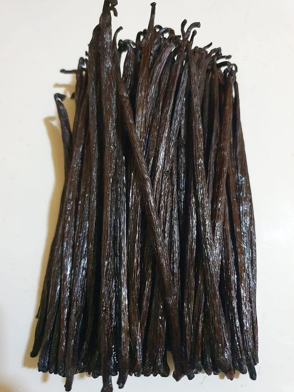 JL Gourmet Imports packaging highlights vanilla bean quality and purity.