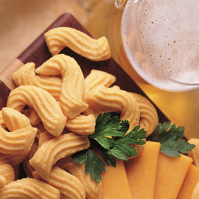 J&M Foods Original Cheese Straws served on plate with soup pairing.