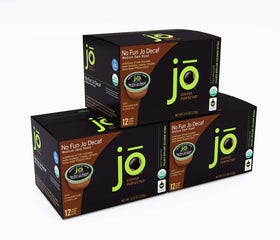 Jo Coffee No Fun Jo Decaf pods close-up highlighting plant-based pod material.