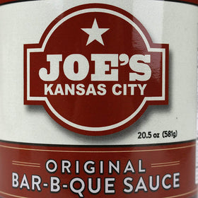 Close-up of Joe's Kansas City Bbq sauce label highlighting tangy, smoky notes.