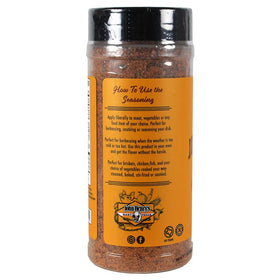 John Henry's Texas Brisket Rub dry rub action on meat.