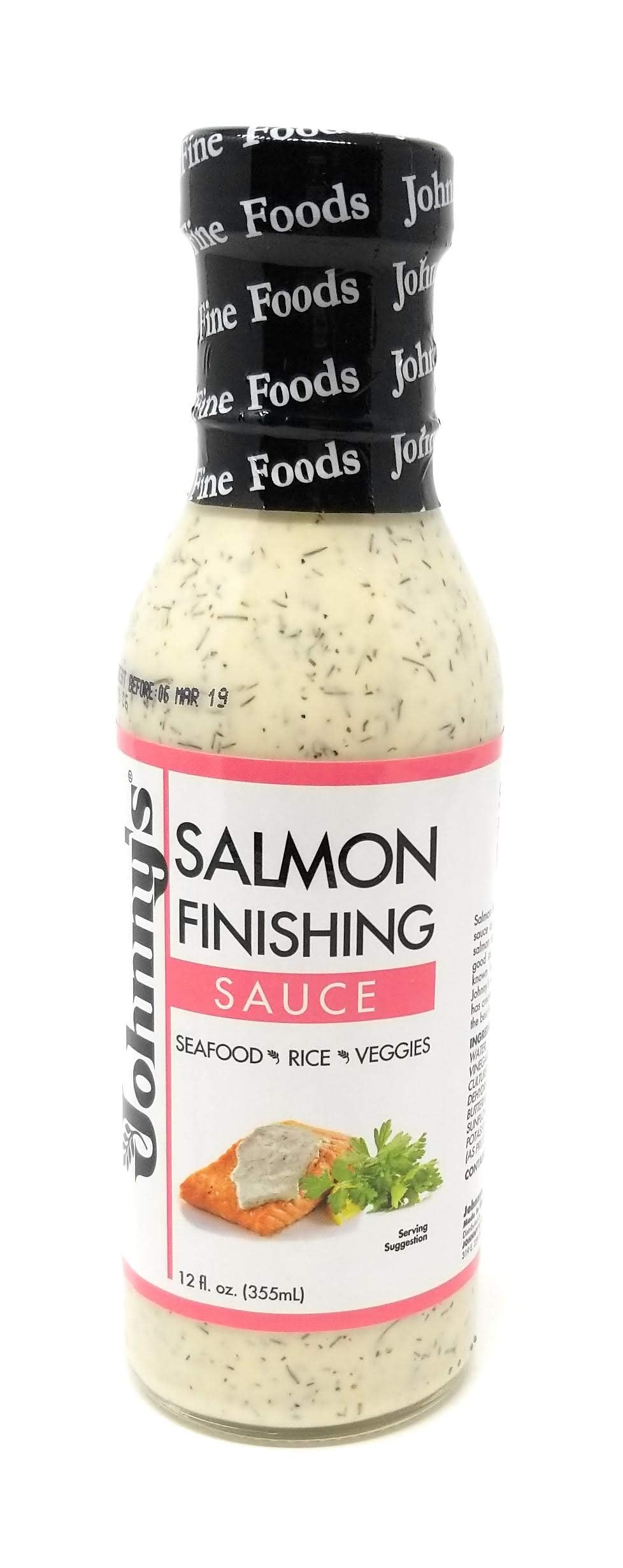 Johnny's Salmon Finishing Sauce bottle ready for finishing a salmon fillet.