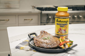Johnny's Seasoning Salt kitchen scene suggests everyday cooking versatility.